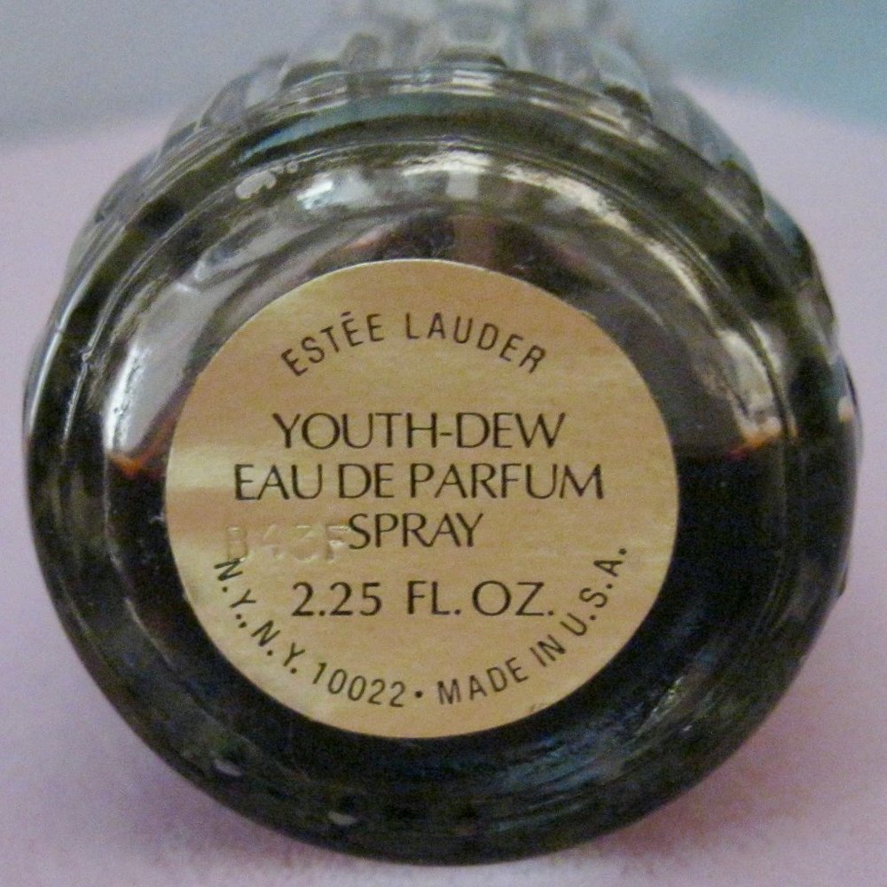 "ESTEE LAUDER YOUTH DEW SPRAY BOTTLE PERFUME ALMOST 1/2 FULL" VERY COLLECTIBLE.